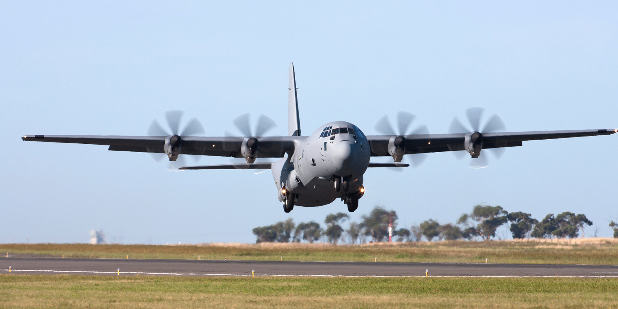 AN/ALQ-251 Radio Frequency Countermeasures c-130 military transport aircraft taking off from runway