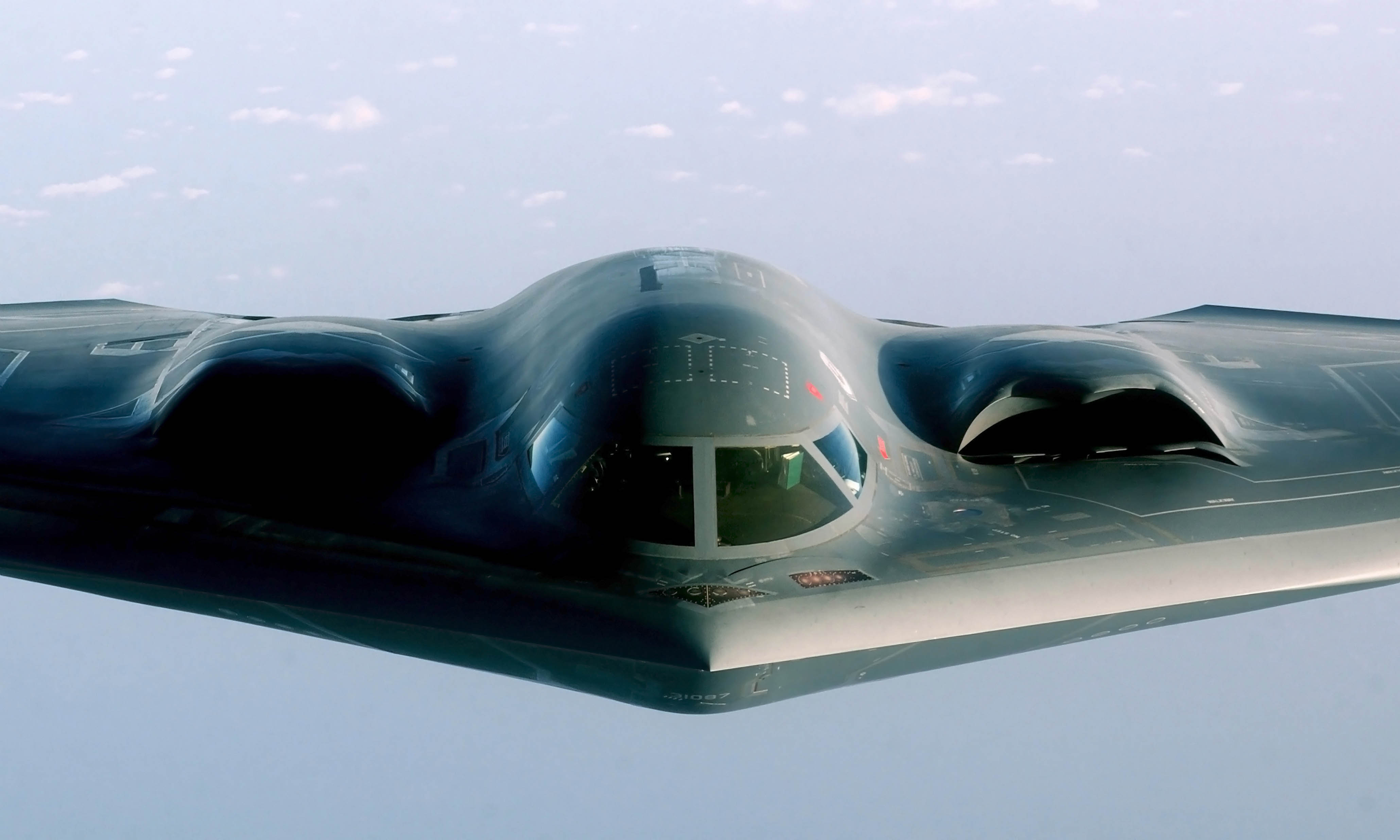 B-2 Spirit, returning from a mission supporting Operation Iraqi Freedom, takes on fuel from a KC-135 Stratotanker over the Indian Ocean.