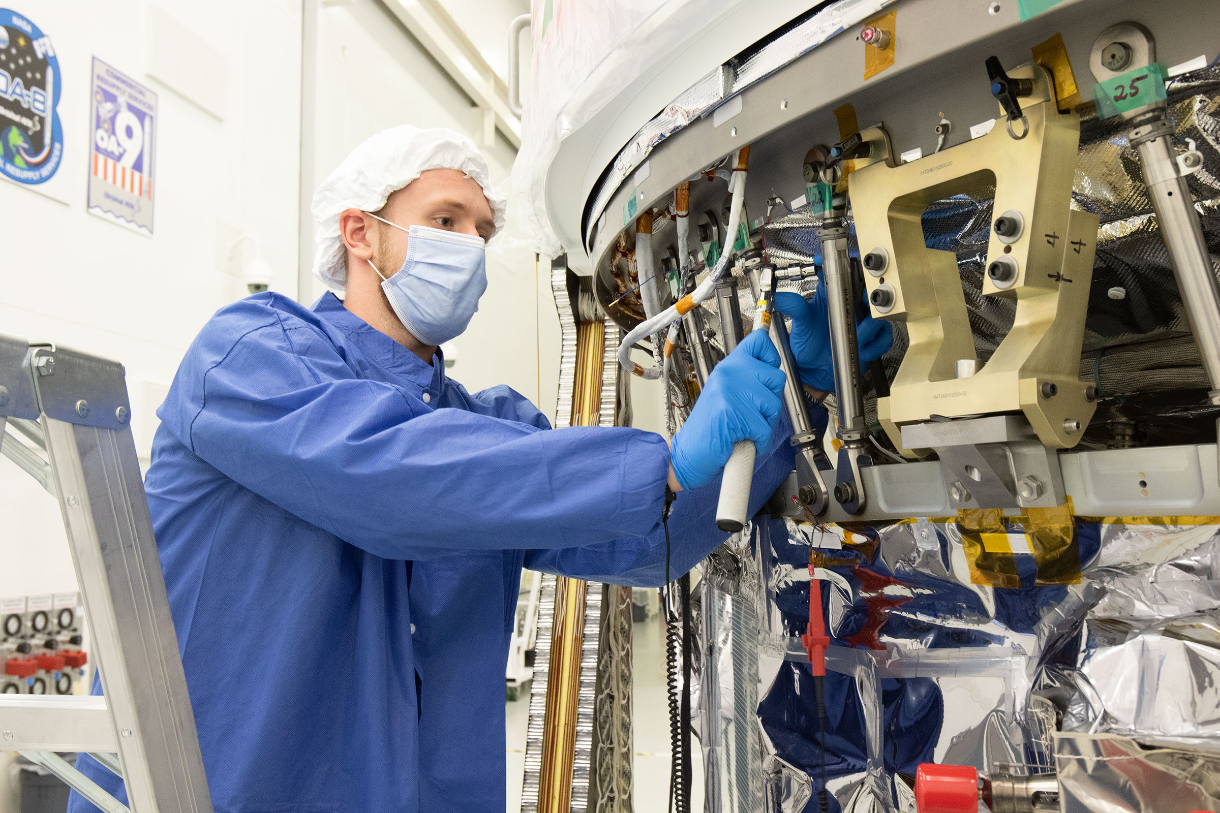 WFF-2020-043-197 White male engineer works on the Cygnus spacecraft in assembly facility in Wallops Island, VA